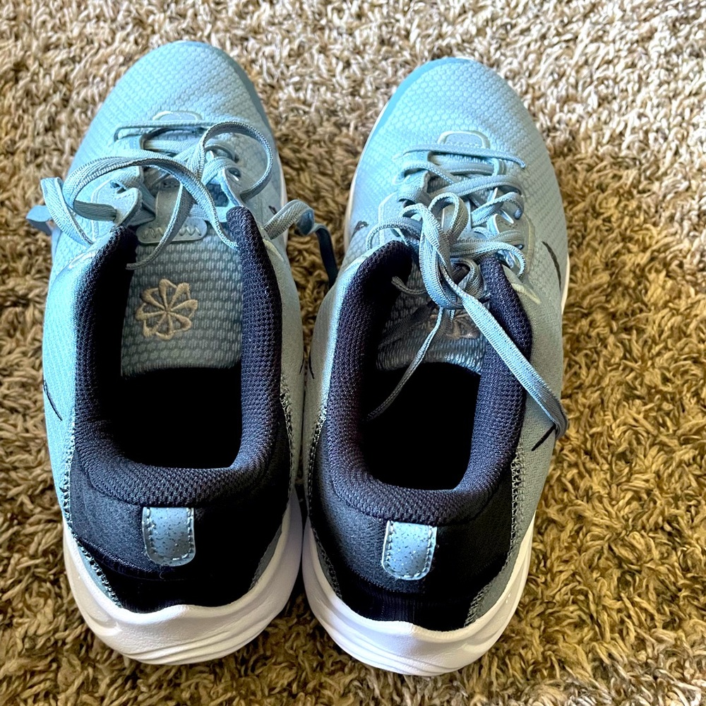 Some blue Nike running shoes